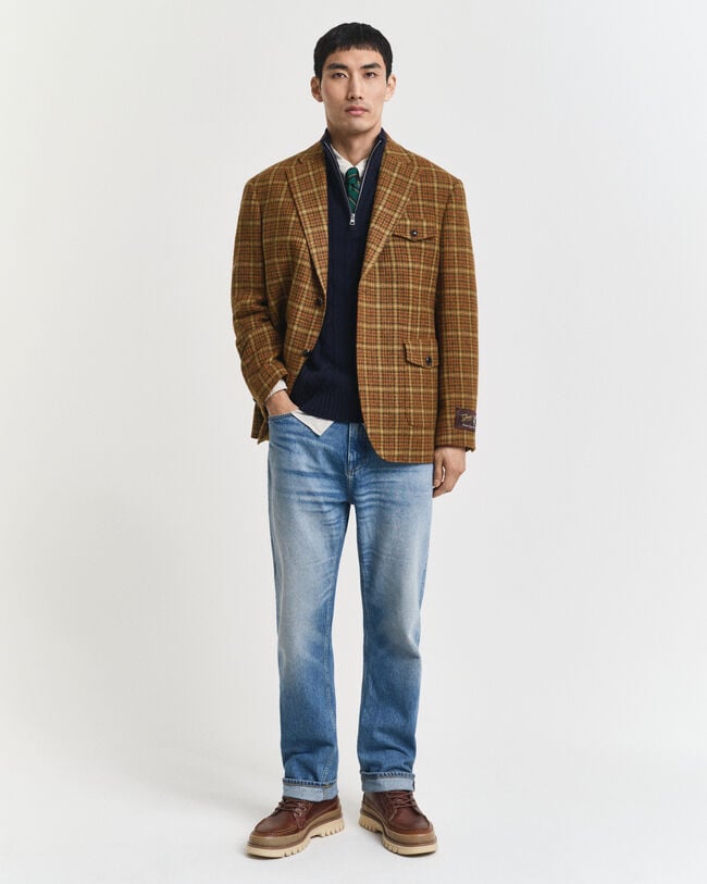 Kabelstrikket sweater af lammeuld med halv lynlås