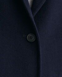 Håndsyet lige blazer