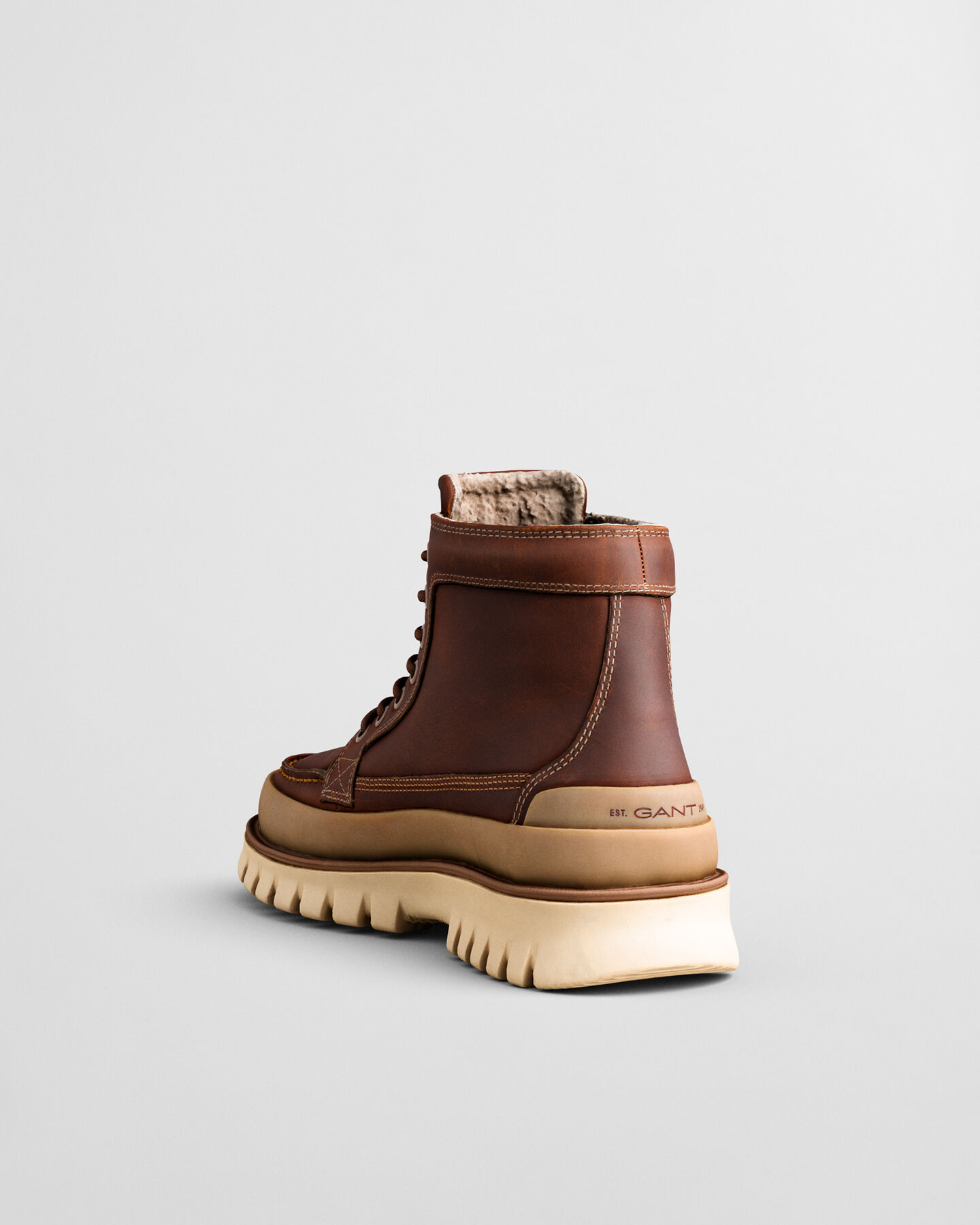 Nebrada mellemhøje læderstøvler