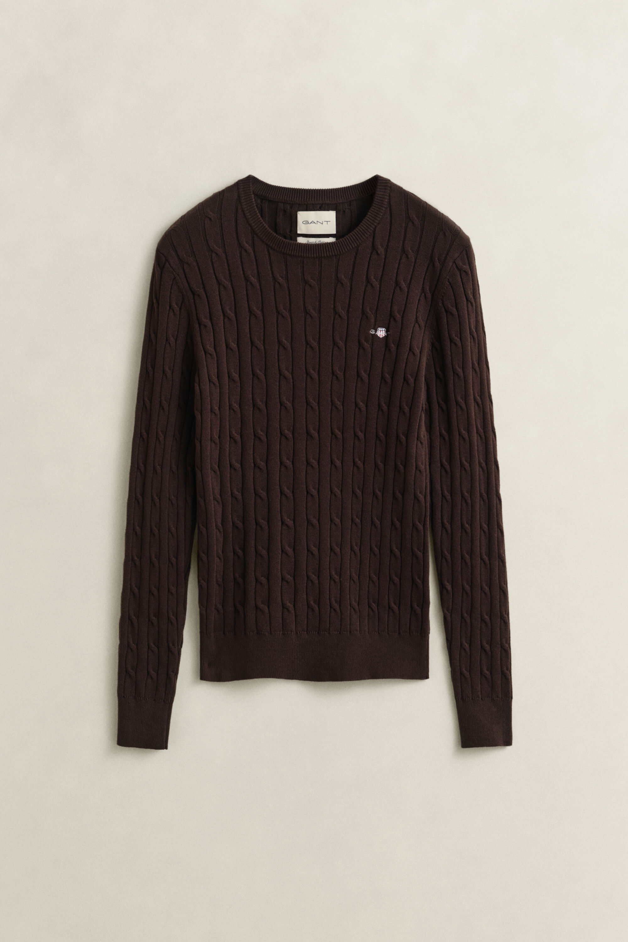 Crewneck sweater af strækbomuld med kabelstrik