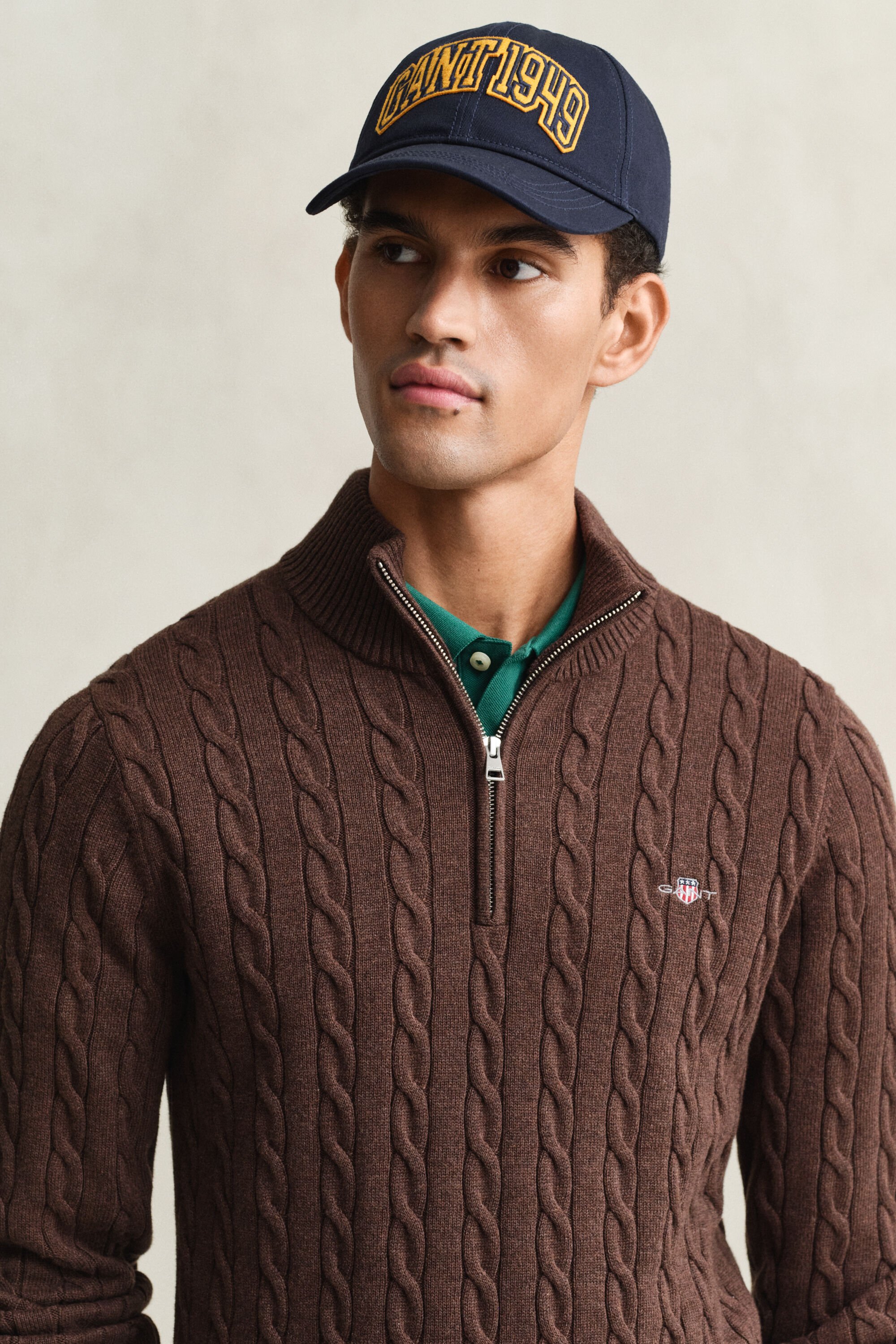 Kabelstrikket sweater af bomuld med halv lynlås