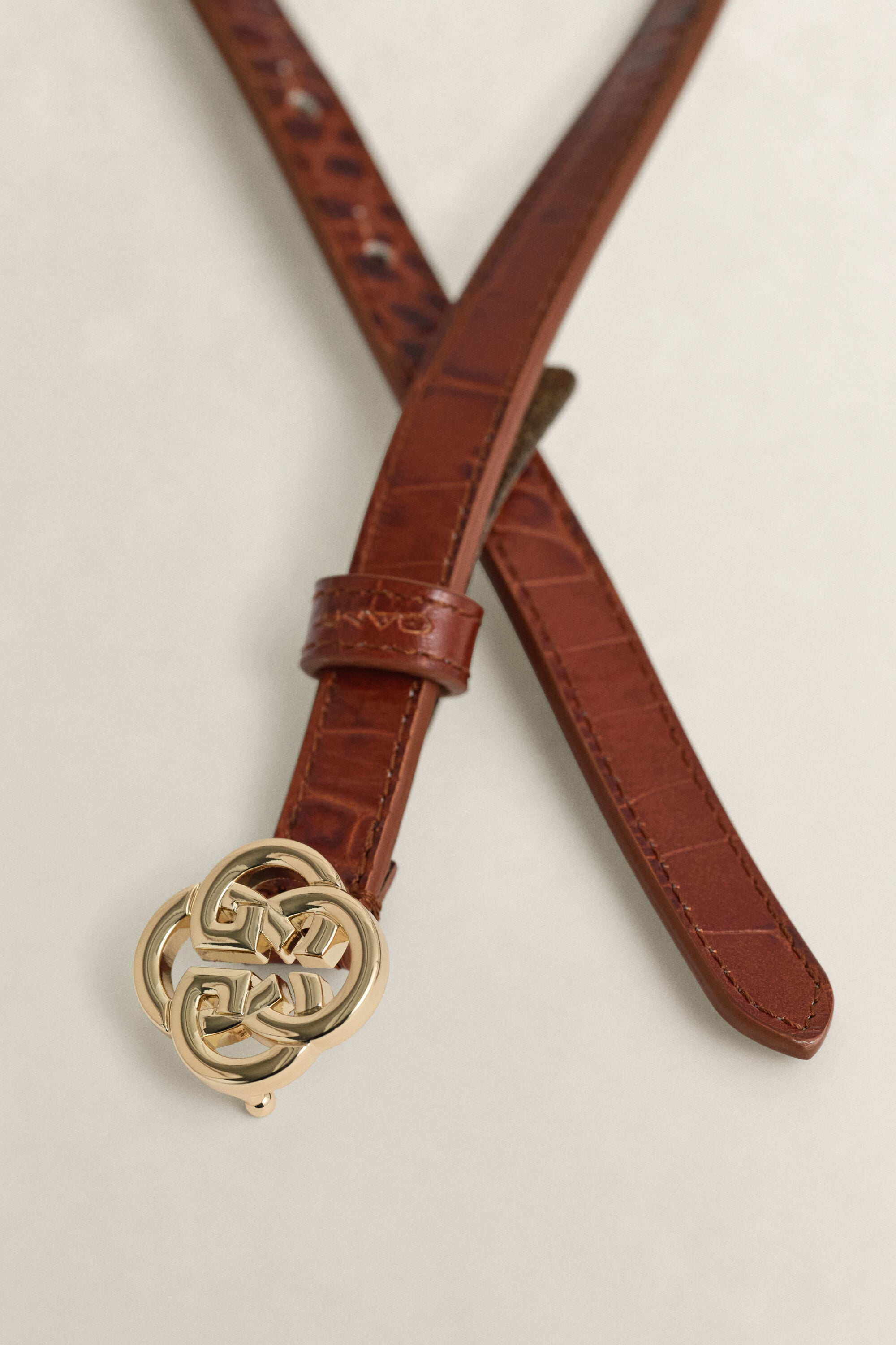 Monogrambælte med krokodilleeffekt
