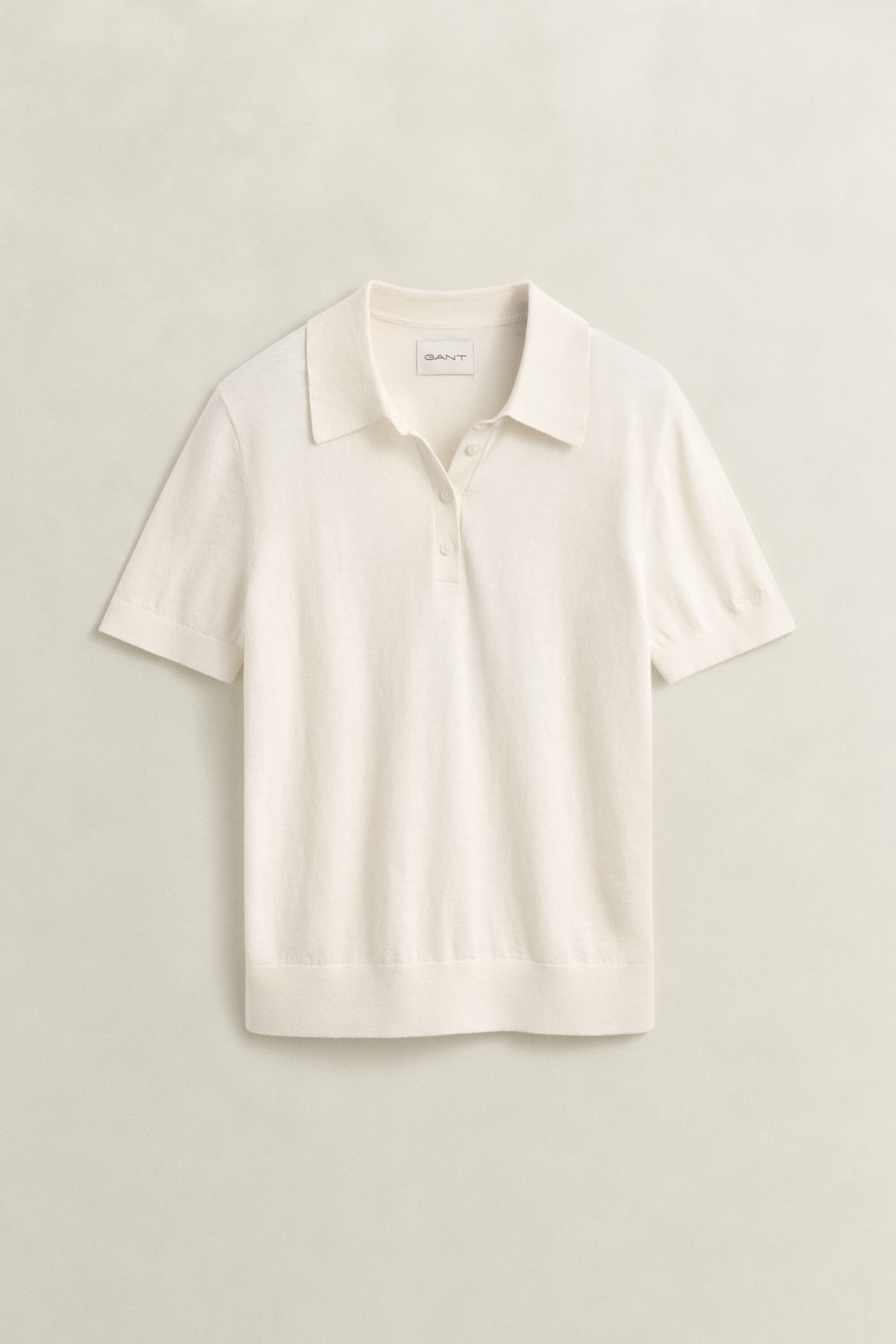 Let strikket polosweater