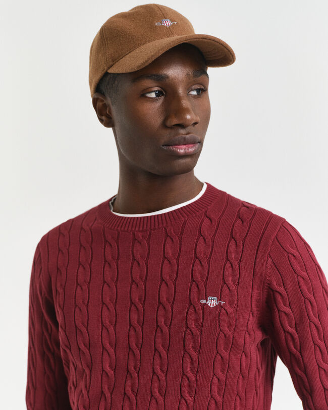 Crewneck sweater af bomuld med kabelstrik