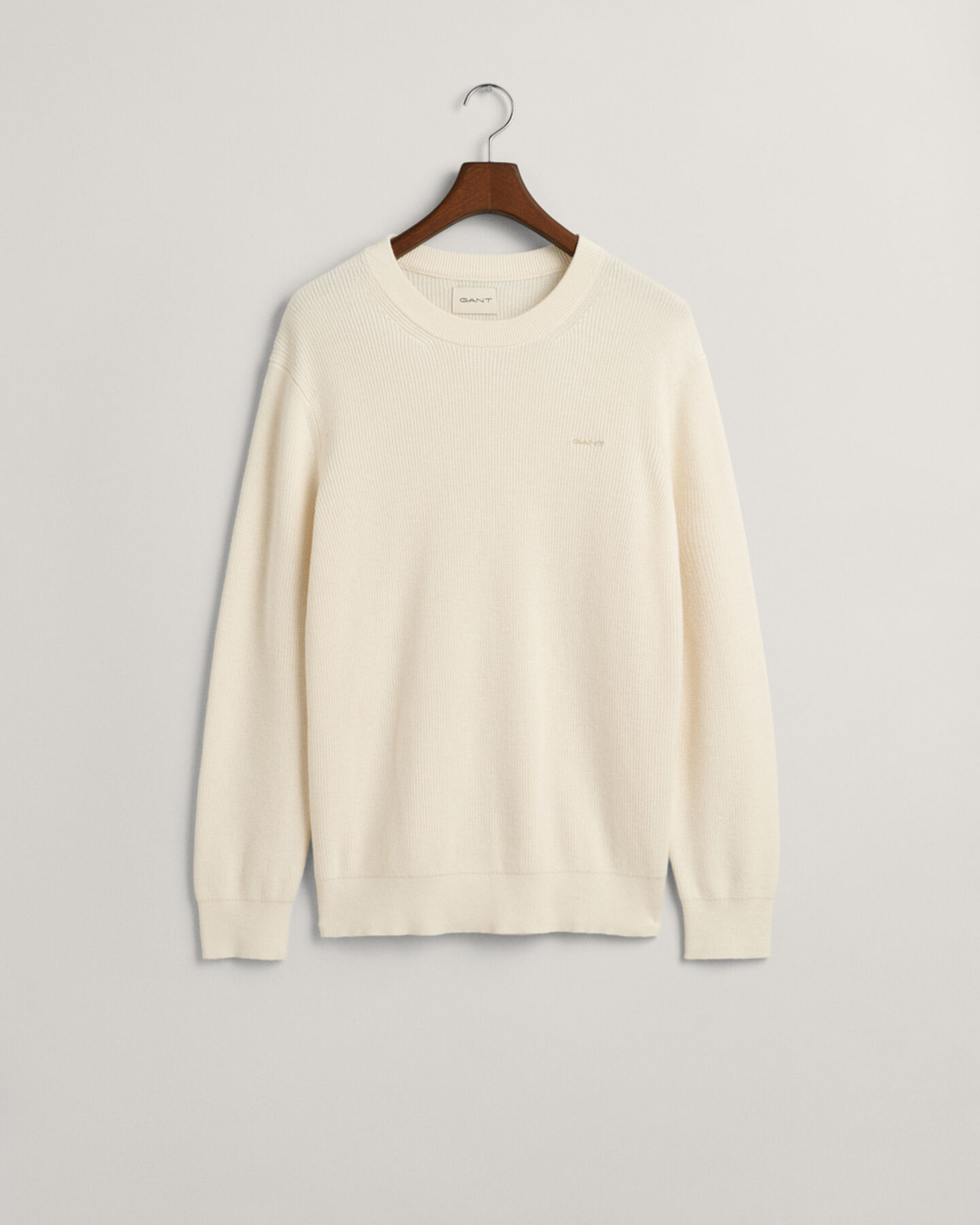 Ribstrikket crewneck sweater af bomuld og uld
