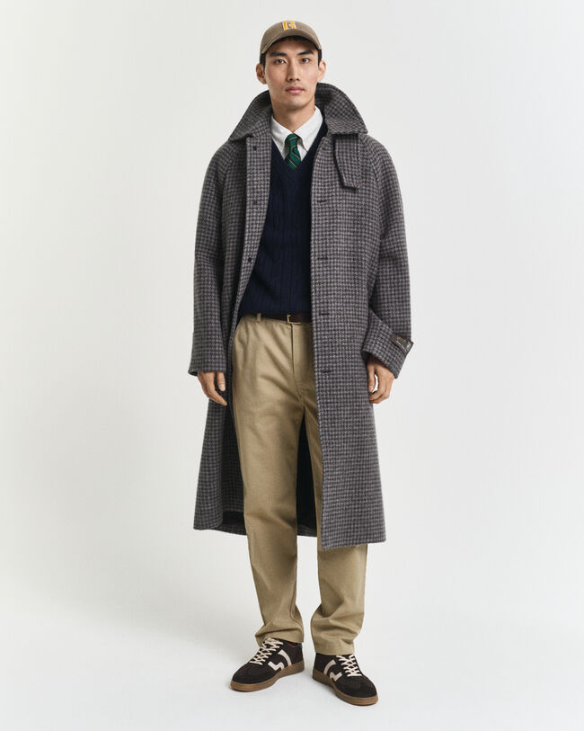 Vest af lammeuld med kabelstrik