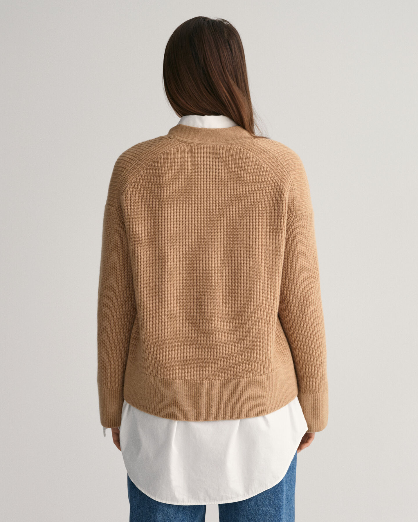 Ribstrikket cardigan af uld