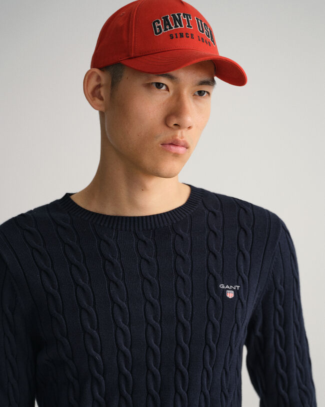 Crewneck sweater af bomuld med kabelstrik