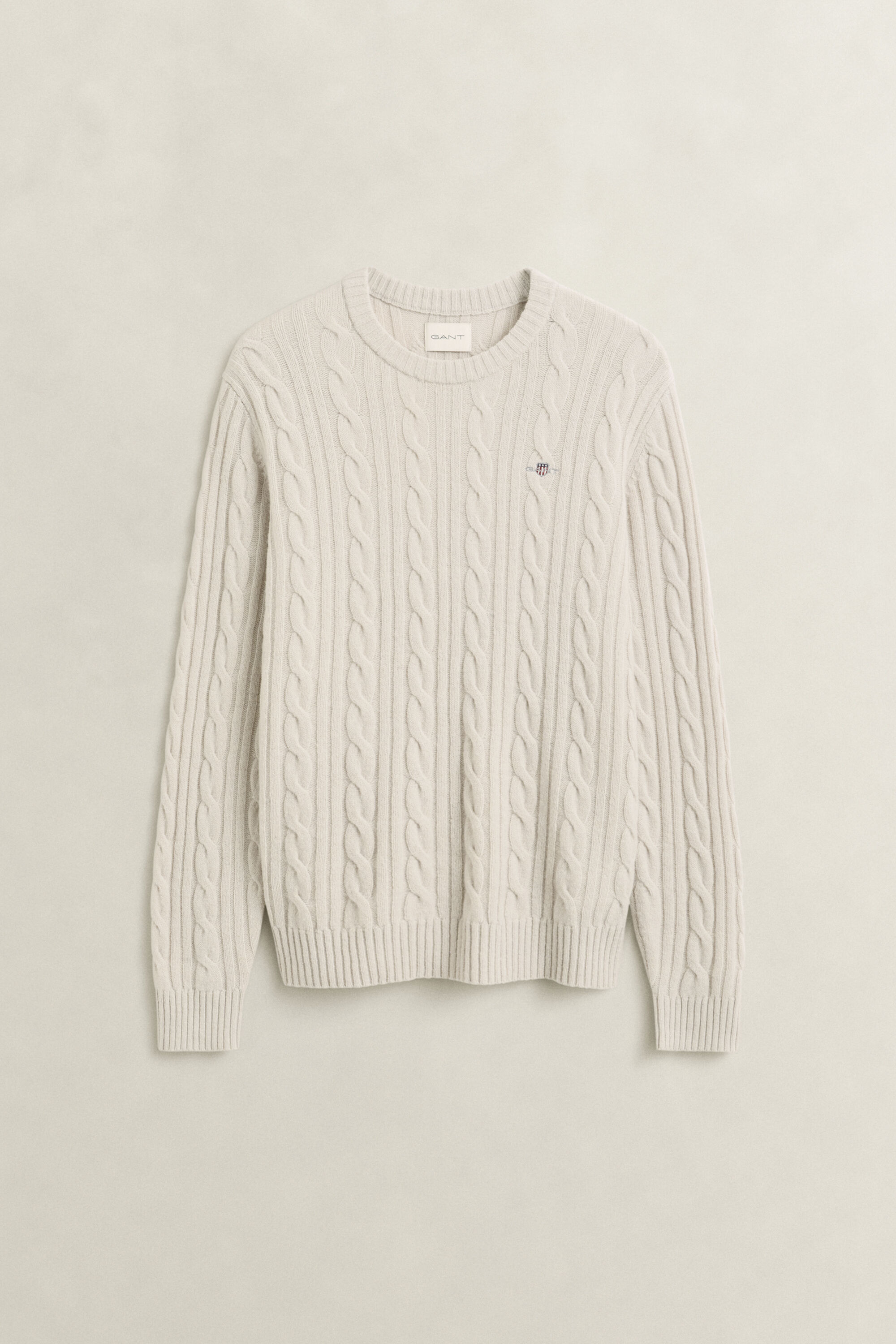 Crewneck sweater af lammeuld med kabelstrik