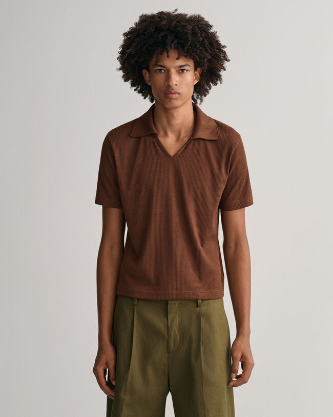 Piqu&eacute; poloskjorte inspireret af 70'erne