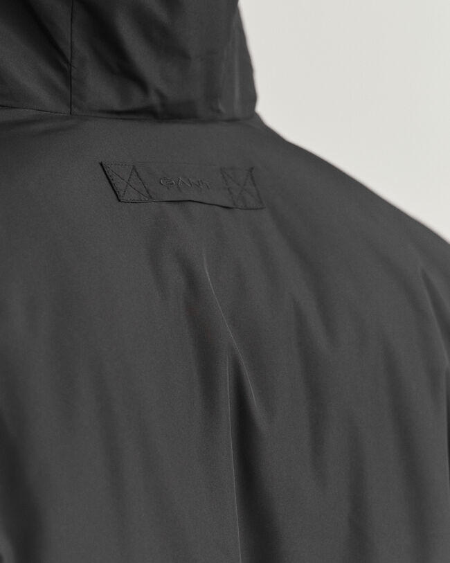 Vendbar jakke med h&aelig;tte