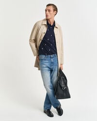 Broderet poloskjorte med båd-grafik