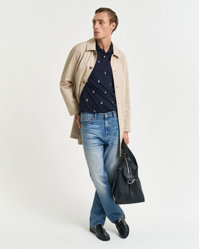 Broderet poloskjorte med båd-grafik