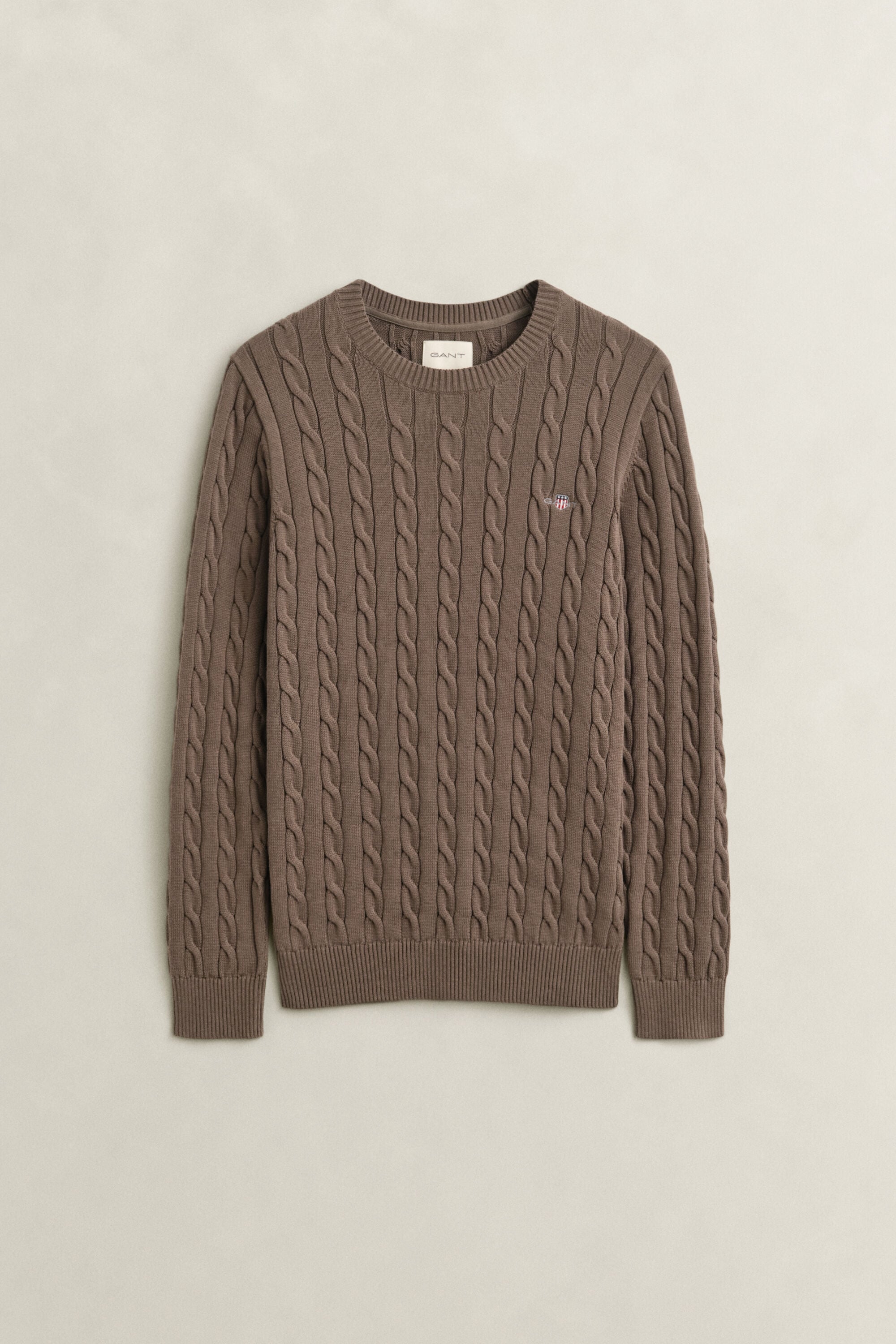 Crewneck sweater af bomuld med kabelstrik