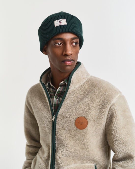 Ribstrikket beanie af bomuldsblanding