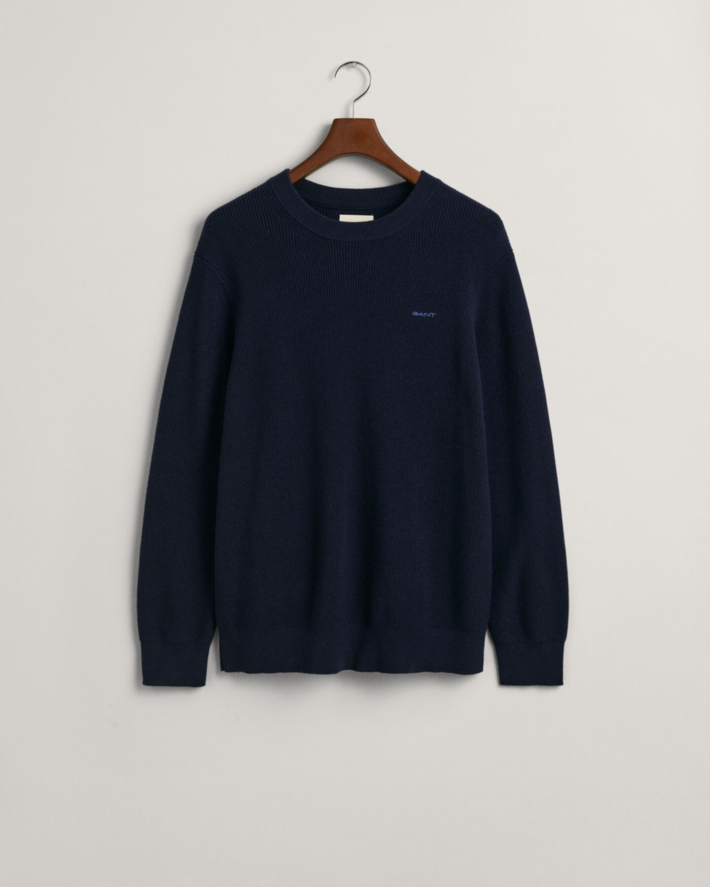 Ribstrikket crewneck sweater af bomuld og uld
