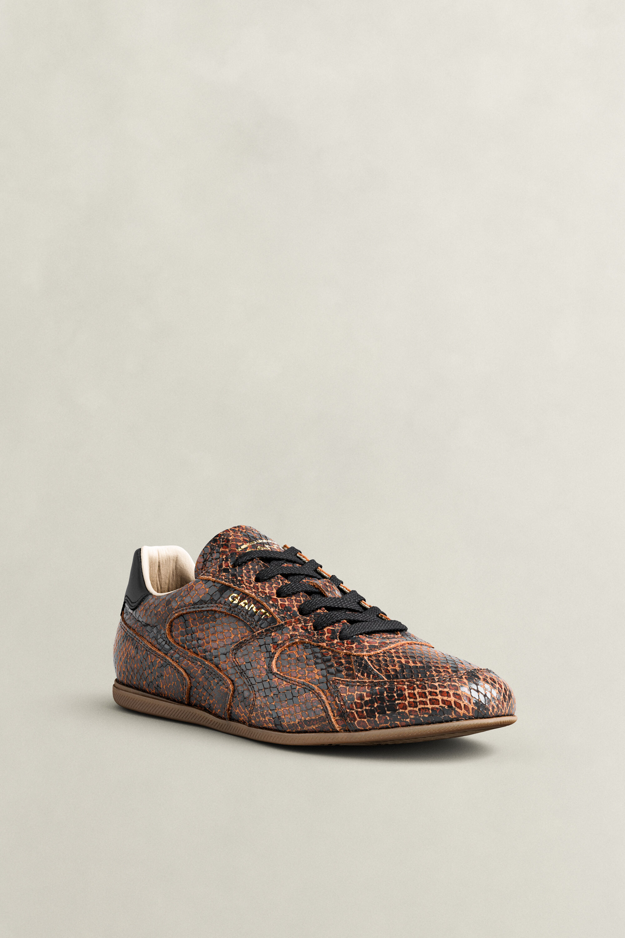 Sperly lædersneakers med prægning af slangeskind
