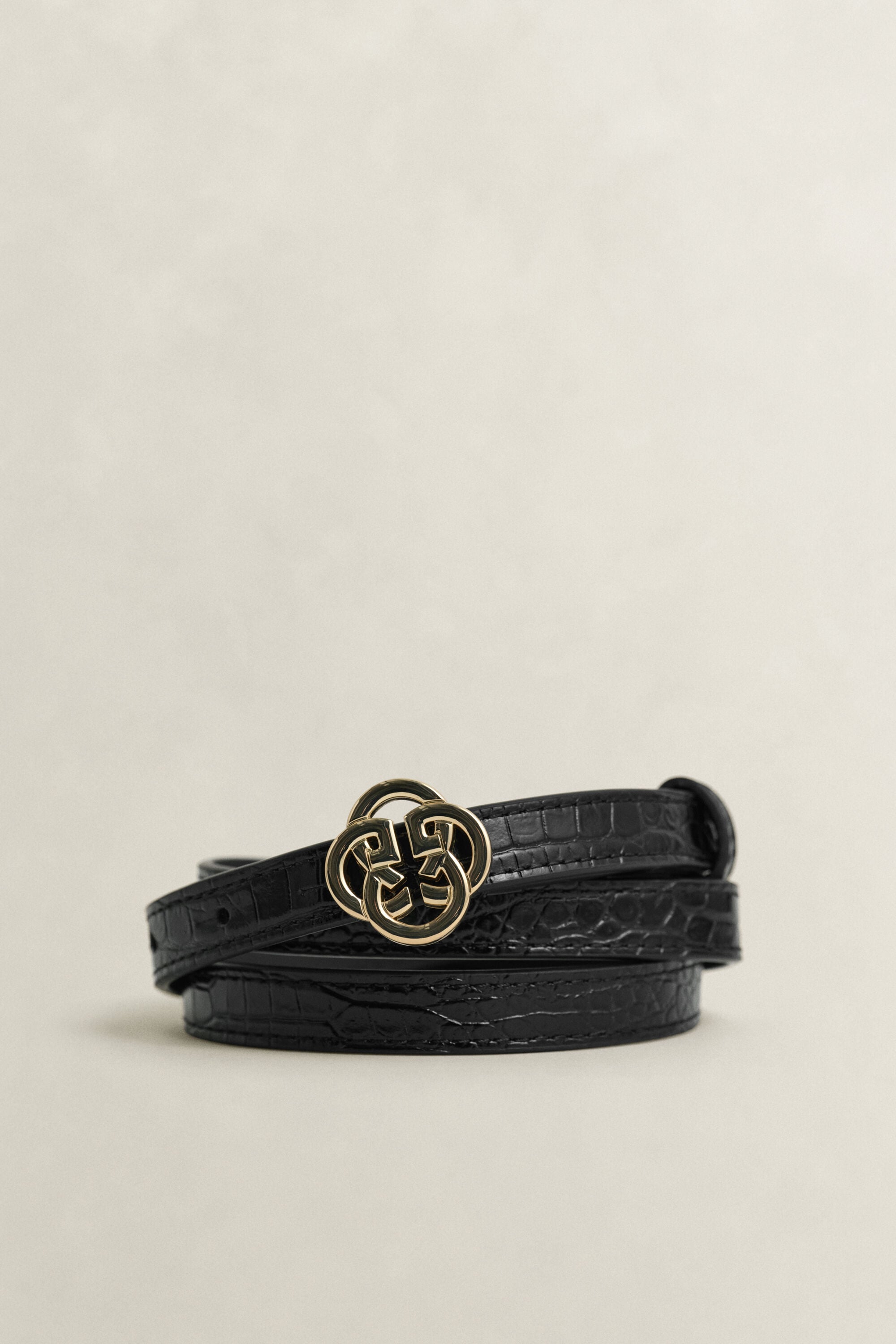 Monogrambælte med krokodilleeffekt