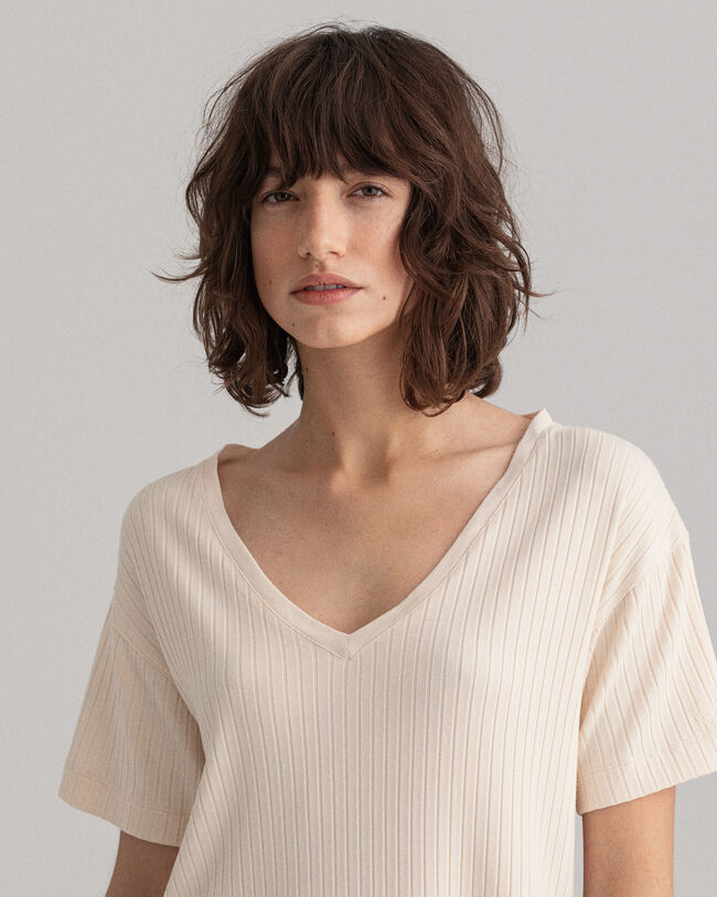 Detail T-shirt med slidser og lange-korte ærmer