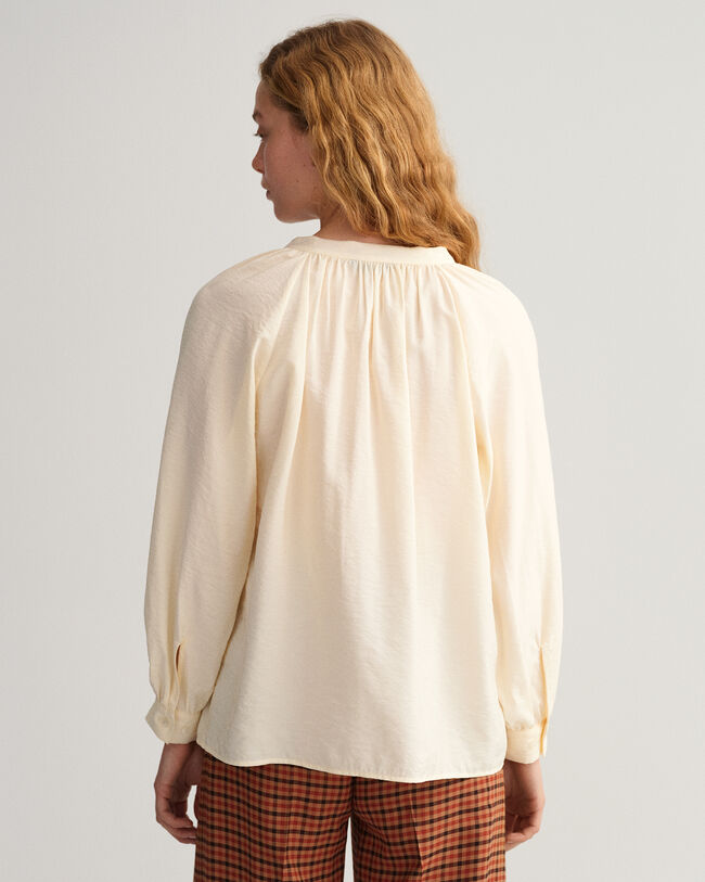 Bluse med stående krave