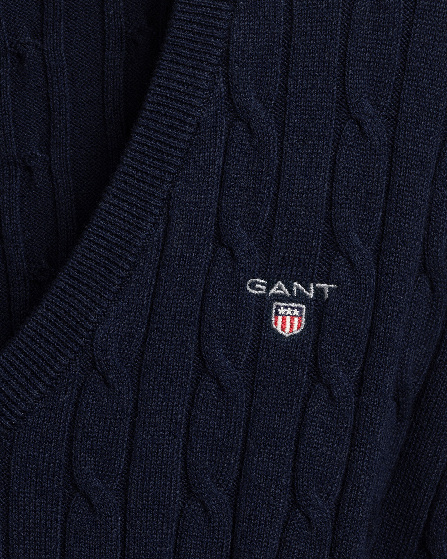 Kabelsweater af strækbomuld med V-hals