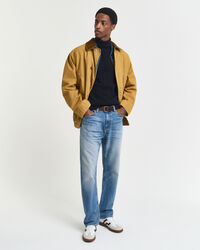 Kabelstrikket sweater af bomuld med rullekrave