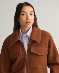 Boucl&eacute; jakke med lynl&aring;s