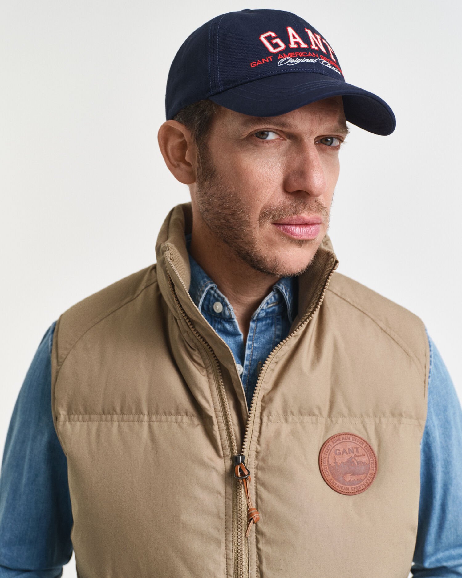 Puffervest med mellemlag af dun