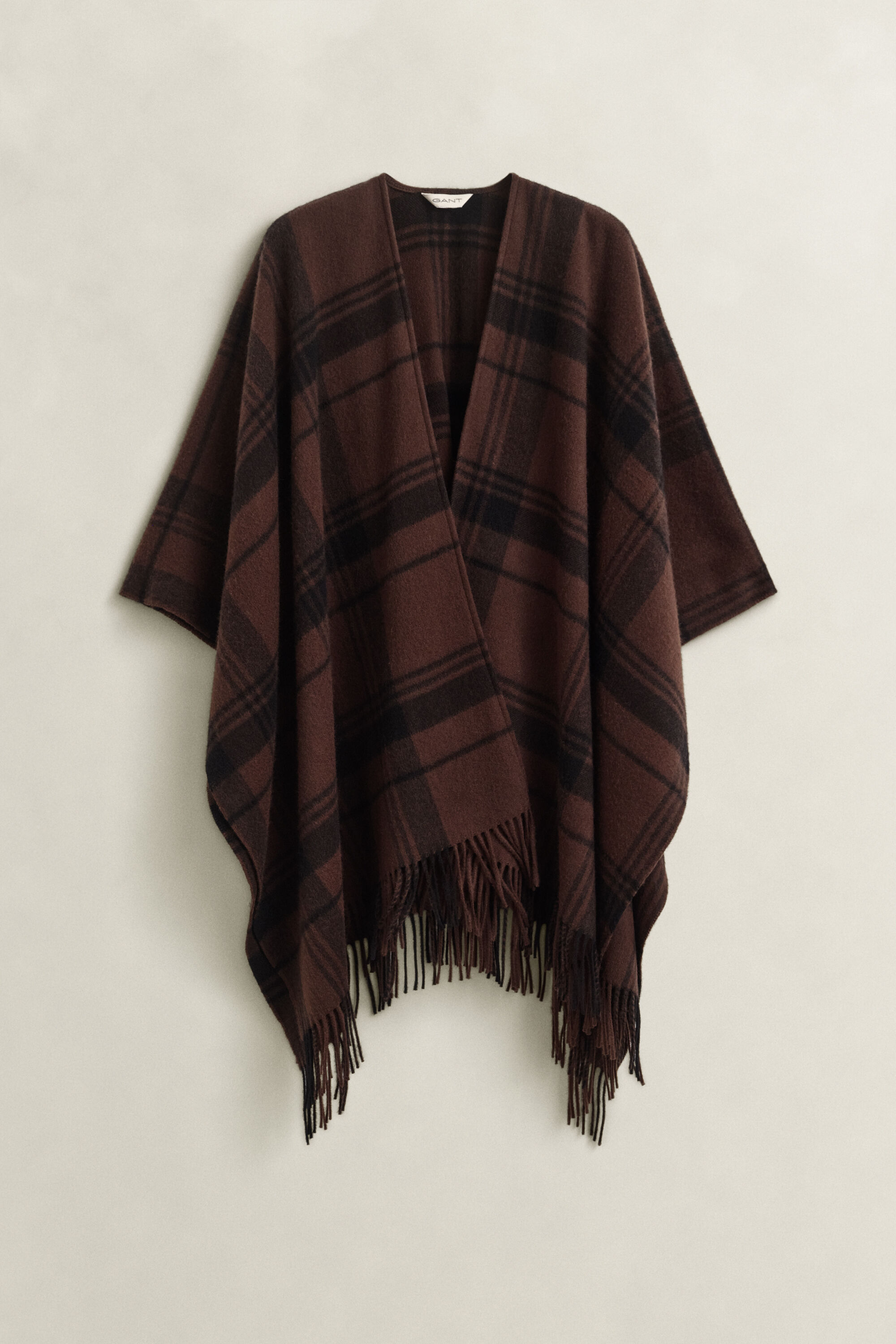 Ternet poncho i uld