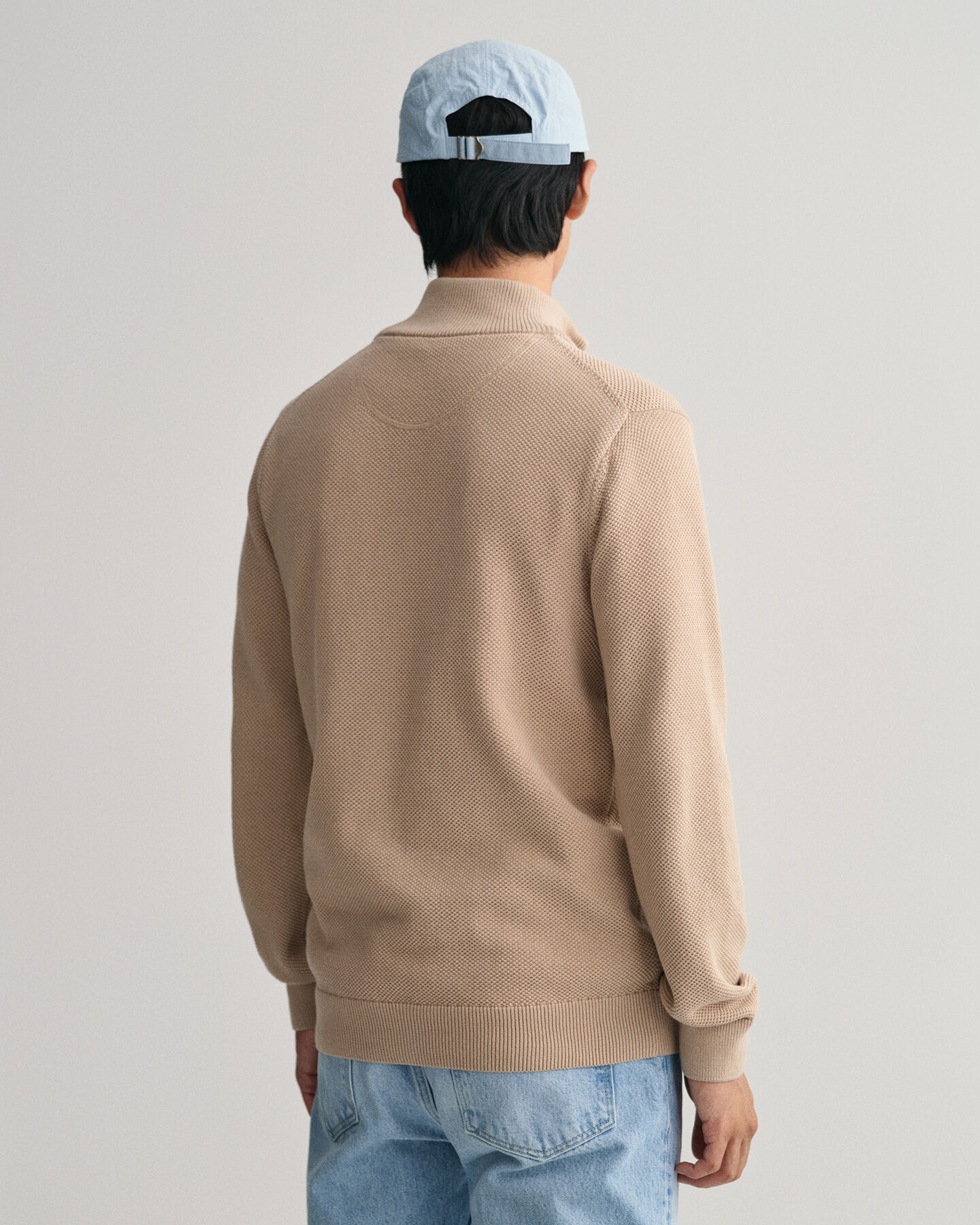 Cardigan af bomuldspiqu&eacute; med lynl&aring;s