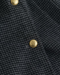 Ternet håndsyet frakke