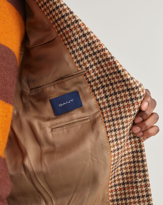 Ternet blazer af tung uld