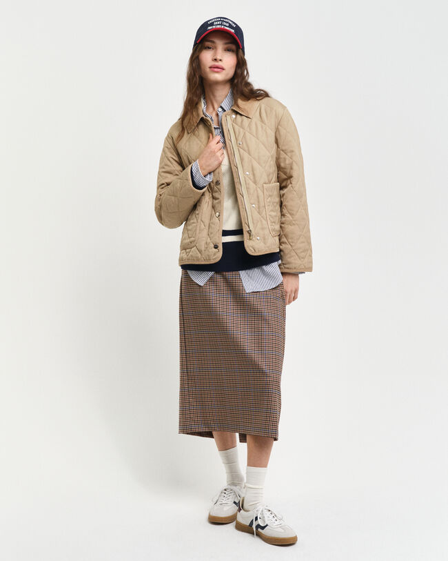 Quiltet jakke med detaljer i jernbanefløjl