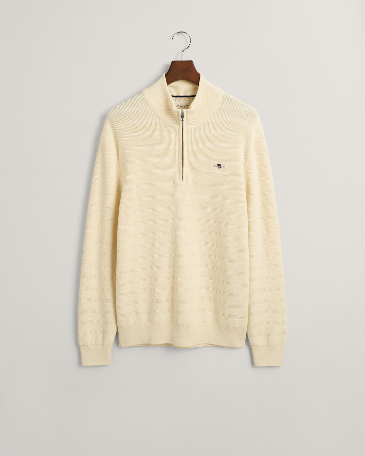 Stribet tekstureret sweater af bomuld med halv lynlås