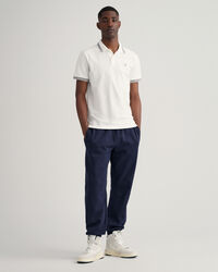 Piqu&eacute; poloskjorte med sildebensm&oslash;nstrede striber