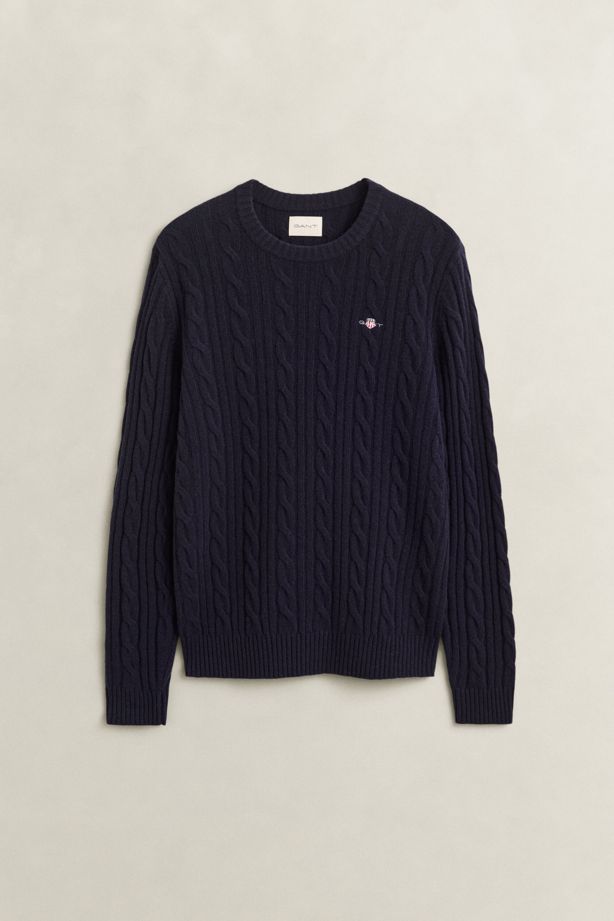 Crewneck sweater af lammeuld med kabelstrik