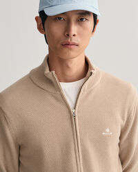 Cardigan af bomuldspiqu&eacute; med lynl&aring;s