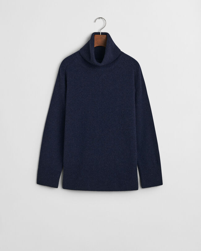 Sweater med rullekrave og sildebensmønstrede detaljer