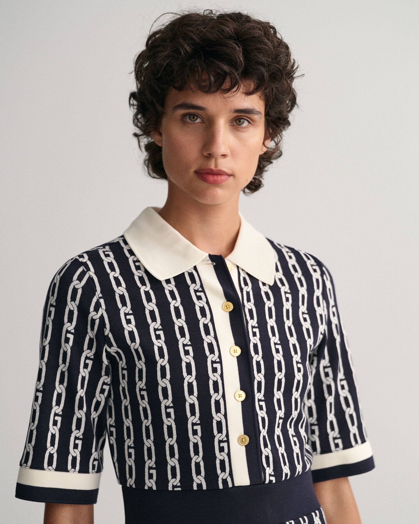 Chain jacquard polokjole med mellemlange ærmer