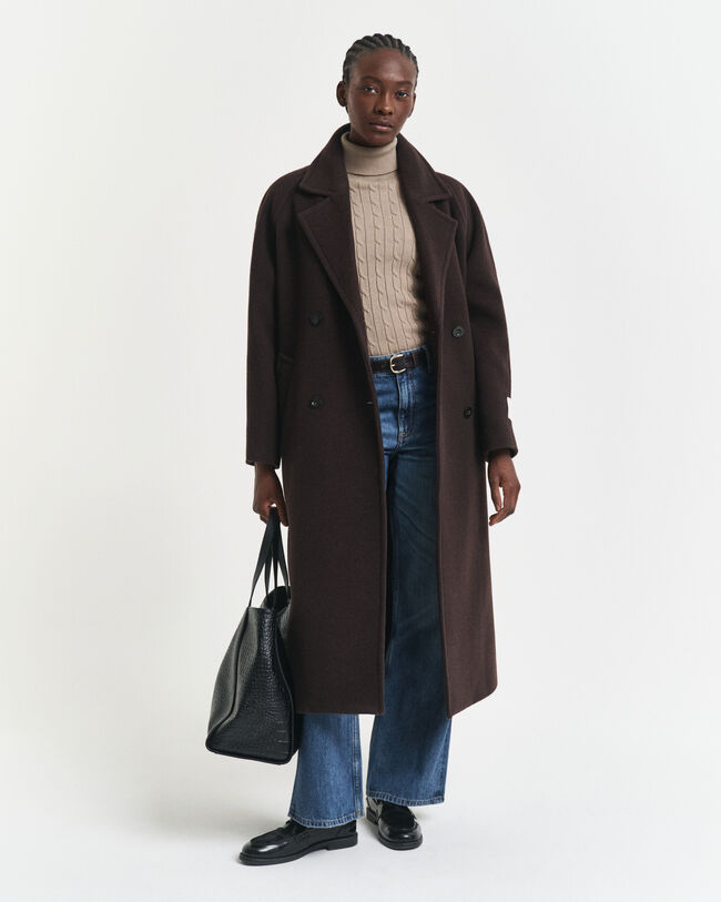 Kabelstrikket sweater af strækbomuld med rullekrave