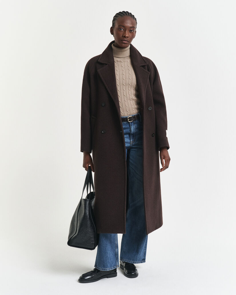 Kabelstrikket sweater af strækbomuld med rullekrave