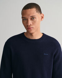 Ribstrikket crewneck sweater af bomuld og uld