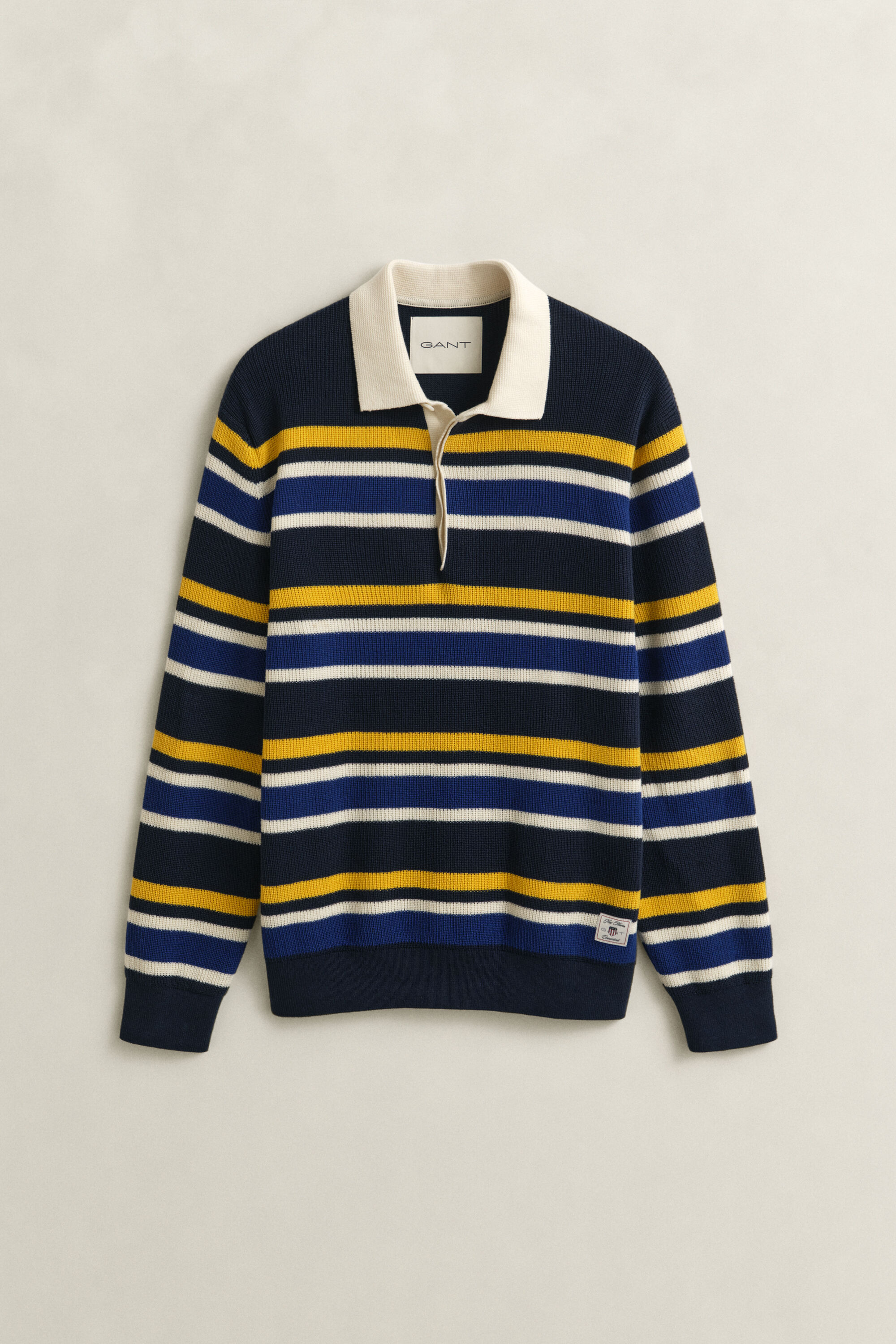 Stribet polosweater med ribstrik
