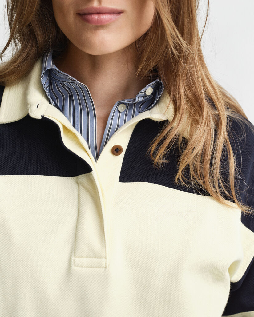 Piqué Rugger med struktur og farveblokke