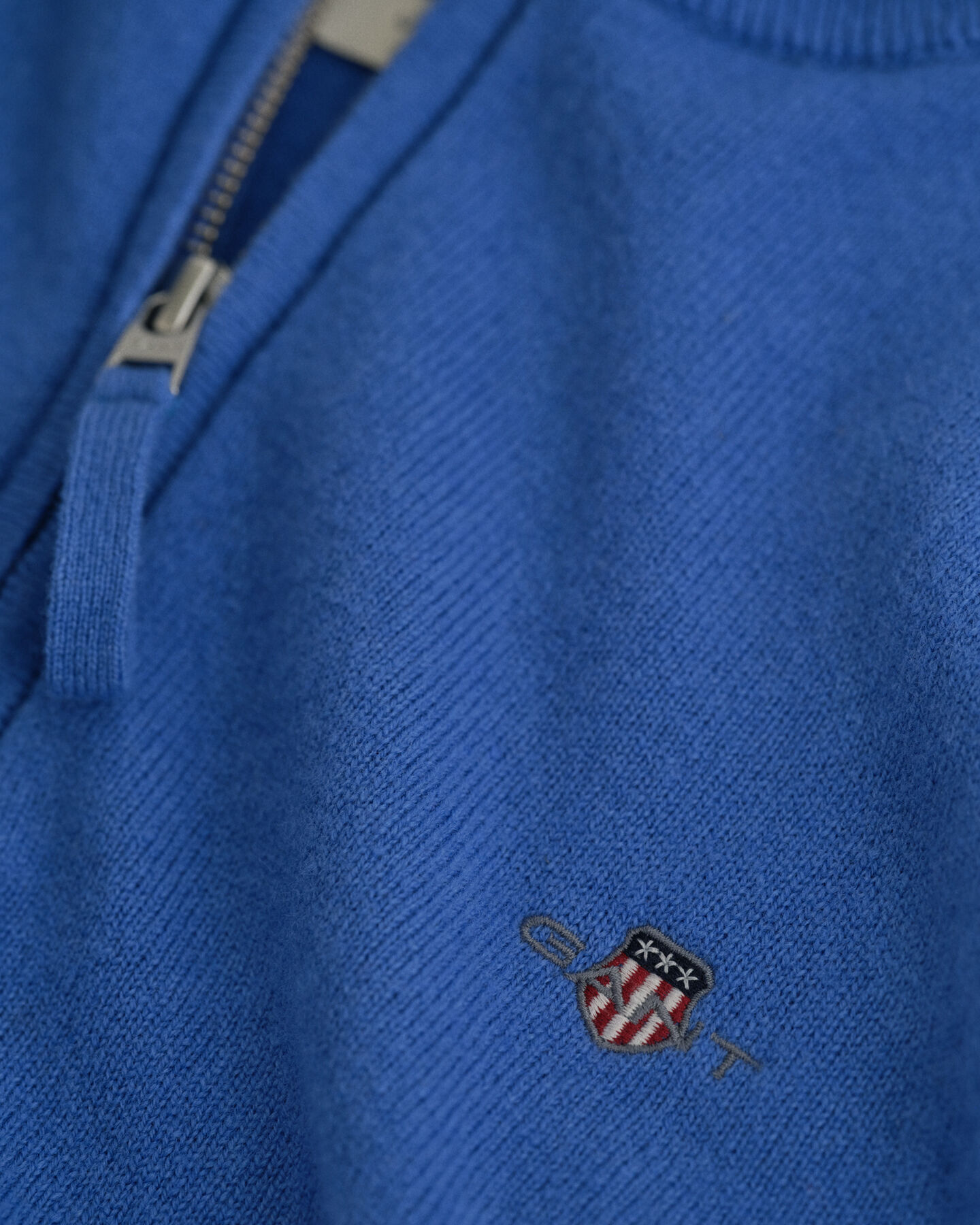 Sweater af ekstra fin lammeuld med halv lynlås