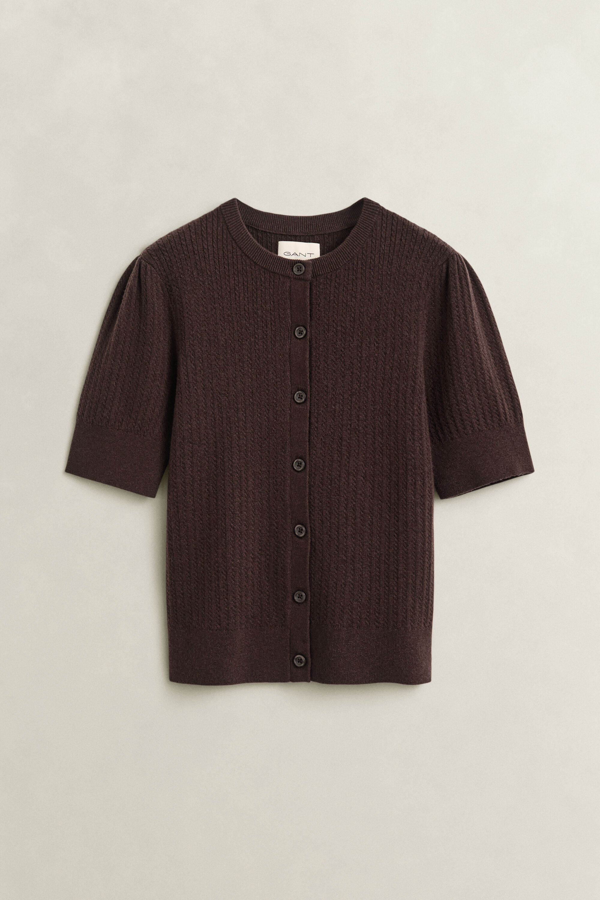 Kabelstrikket cardigan med korte ærmer