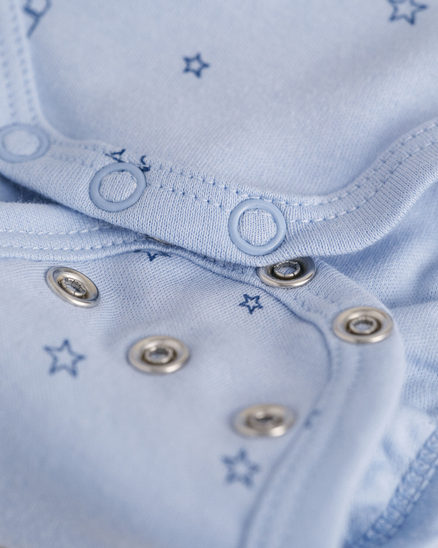 Bodysuit med Baby Star & G-tryk