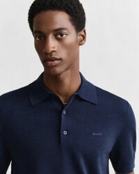 Kort&aelig;rmet polosweater af ekstra fin merinould