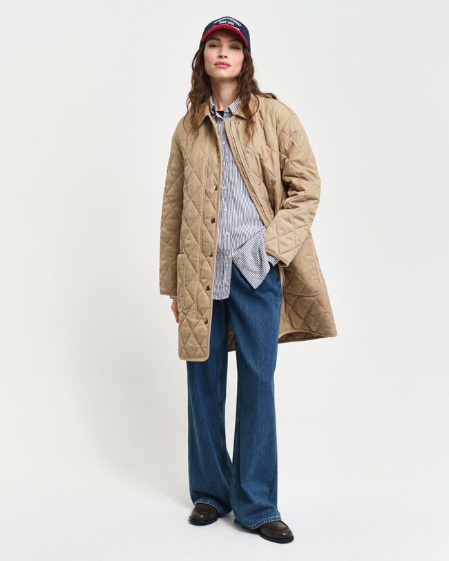 Quiltet frakke med detaljer i jernbanefløjl