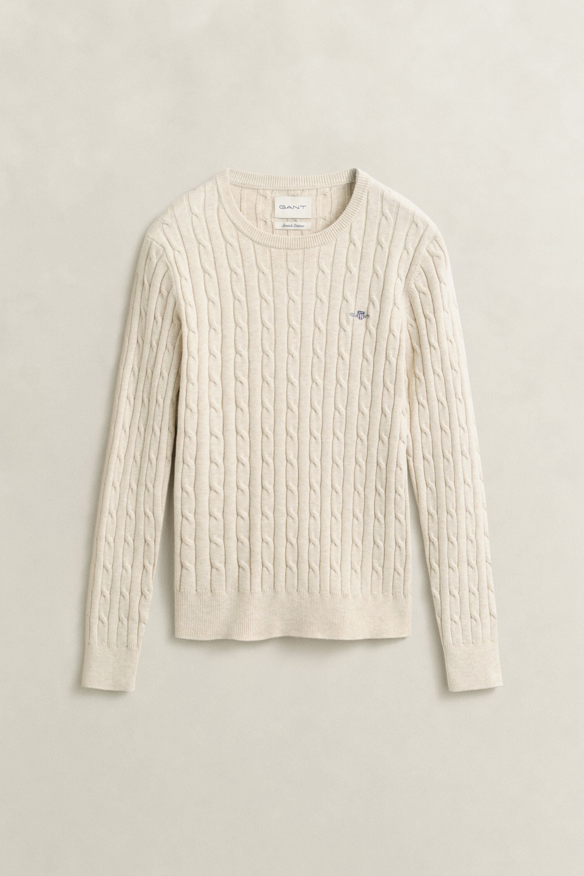 Crewneck sweater af strækbomuld med kabelstrik